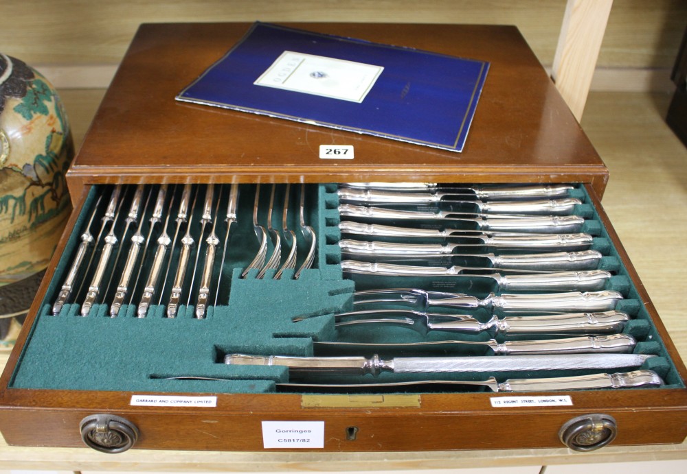 A Garrard & Co canteen of plated cutlery and flatware, for twelve people, in three drawer case